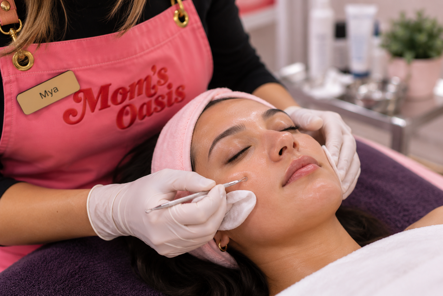 Woman receiving a clarifying facial with professional extractions at Mom’s Oasis spa in American Fork, Utah